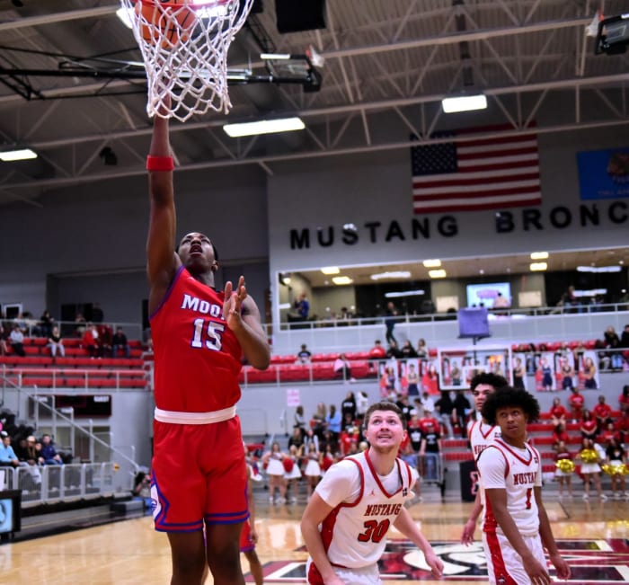 Moore senior Darian Grant (15) has been a major contributor for the Lions during their current 11-game winning streak as they start Class 6A postseason play.